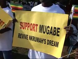 Supporters and protesters welcome Mugabe at AU summit News Clip