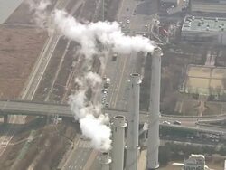 WS AERIAL TS View of Thermal power plant with smoke at Mok dong Seoul / Seoul, South Korea Stock Footage