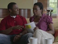 MS Couple talking around relaxing on sofa in living room / Portland, Oregon, United States  Stock Footage