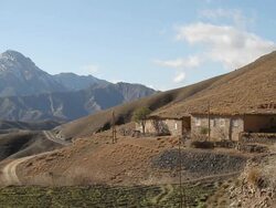 WS View of hillside home on right side with partial atals mountains / Marrakech, Tensift, Morocco  Stock Footage