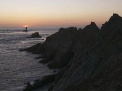 View of La Pointe du Raz at sunset / Plogoff, Bretagne, France Stock Footage