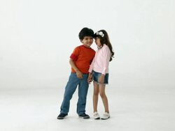 Portrait of two kids whispering  Stock Footage