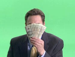 CU, Happy businessman holding fan of American dollar banknotes in front of face in studio, portrait Stock Footage