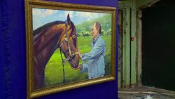 CLEAN : Russian strongman appears as Superputin in new exhibition News Clip