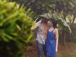 Young couple romancing in rain season, Delhi, India Stock Footage