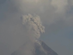 T/L video of ash exploding during volcanic eruption, Philippines, Dec 2009 Stock Footage