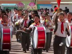 MS School marching band at school sports meeting AUDIO / xi'an, shaanxi, china Stock Footage