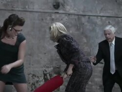 Two women fighting with pugil sticks Stock Footage