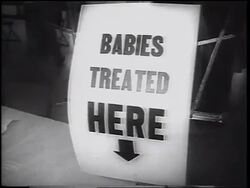 B/W 1962 close up "Babies Treated Here" sign / oral polio vaccine / Texas / newsreel Stock Footage