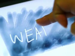 WEATHER writing text on tablet touchscreen Stock Footage