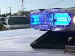 Medium Close Up Pan Right Pan Left - Flashing police lights / New Orleans Louisiana Stock Footage