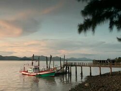Small fishing boat at harbor. Stock Footage