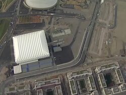 Aerial overhead tracking C/U Olympic Park under construction Stock Footage