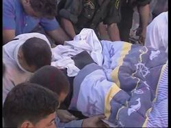 Crowds desperately search for survivors in rubble, bodies carried away News Clip