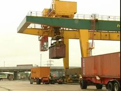 Crane lowering container, Container Terminal, Southampton, UK Stock Footage