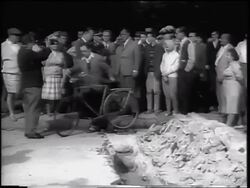 B/W 1961 crowd of West Germans standing on sidewalk near Berlin Wall construction / newsreel Stock Footage