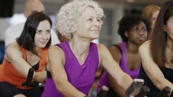 Adult Exercise Bike Class Stock Footage