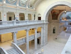 Wide shot of person walking through capitol. Stock Footage