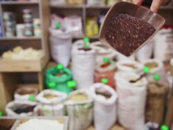 In the grocery. Taking quinoa from sack Stock Footage