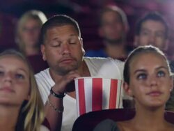 Guy with cellphone in Cinema Stock Footage