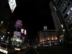 MS POV View of illumination city at night and moving traffic on road / Ginza, Tokyo, Japan Stock Footage