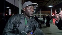 CLEAN : British tourists repatriated from Gambia arrive in Manchester News Clip
