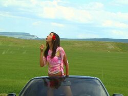 Young beautiful women  having fun in car window Stock Footage