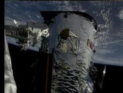 Astronaut working on Hubble Telescope in space Stock Footage