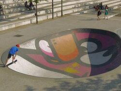 Skateboarder in colorful skatepark,lyons,MS Stock Footage
