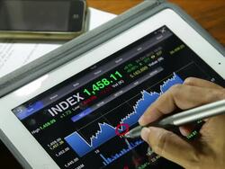 Businessman using Tablet analysis stock data. Stock Footage