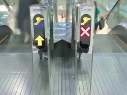 Traffic lanes sign on escalator Stock Footage