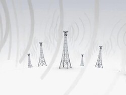Camera glides horizontally past cell towers emitting waves on a globe Stock Footage