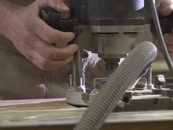 CU Carpenter using saw/ Slovenia Stock Footage