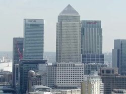 WS AERIAL ZO View of Thames river. Includes landmarks such as Tower Bridge, O2 (Millennium Dome) and Canary Wharf / London, United Kingdom  Stock Footage