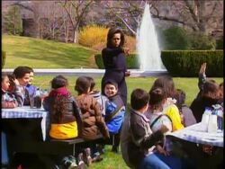 Twenty-six elementary schoolchildren wielded shovels, rakes, pitchforks and wheelbarrows to help first lady Michelle Obama break ground on a produce and herb garden on the White House grounds. News Clip