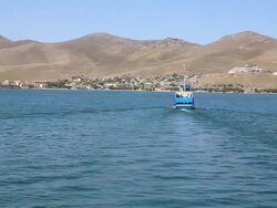 Sevan lake, ship sailing in the lake Stock Footage