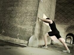 Muscular Male Runner Warming Up Before Run Stock Footage
