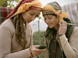 People of Himachal Pradesh: Beautiful young women using mobile phone Stock Footage