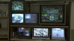 Multiple computer monitors display data. Stock Footage