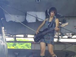 Young Woman Playing Guitar on Plane Stock Footage