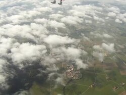Woman sky diver performs acrobatic mid-air stunts Stock Footage
