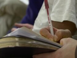 Hispanic immigrants watch speech Stock Footage