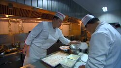Chefs prepare food in a restaurant kitchen. Stock Footage