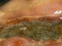 Bacon Cooking in the Frying Pan Stock Footage