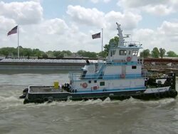 MS T/S View of tugboat flowing on mississippi river / New Orleans, Louisiana, United States Stock Footage