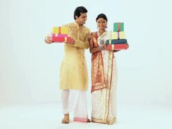 Bengali couple showing lots of gift box  Stock Footage