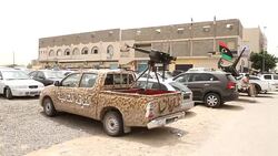 CLEAN : Armed men surround another Libya News Clip