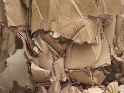 Bundles of Cardboard Waste TILT UP Stock Footage