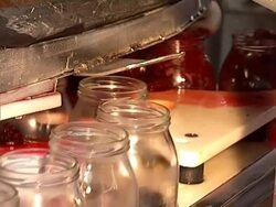 Glass jar with beetroot on conveyor line Stock Footage