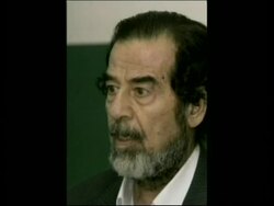 STILLS Saddam in court amid defence team claims he was attacked during hearing News Clip